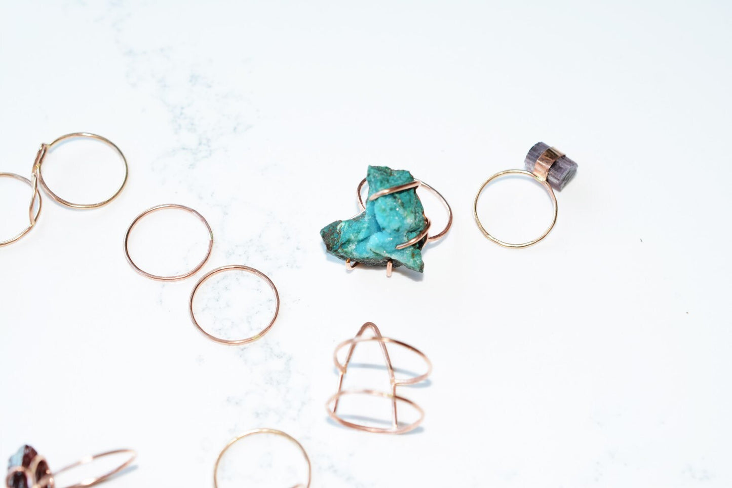 Double ring with triangle.