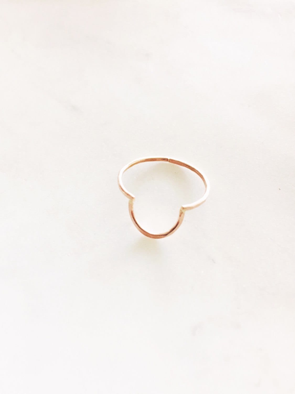 Open half circle ring.