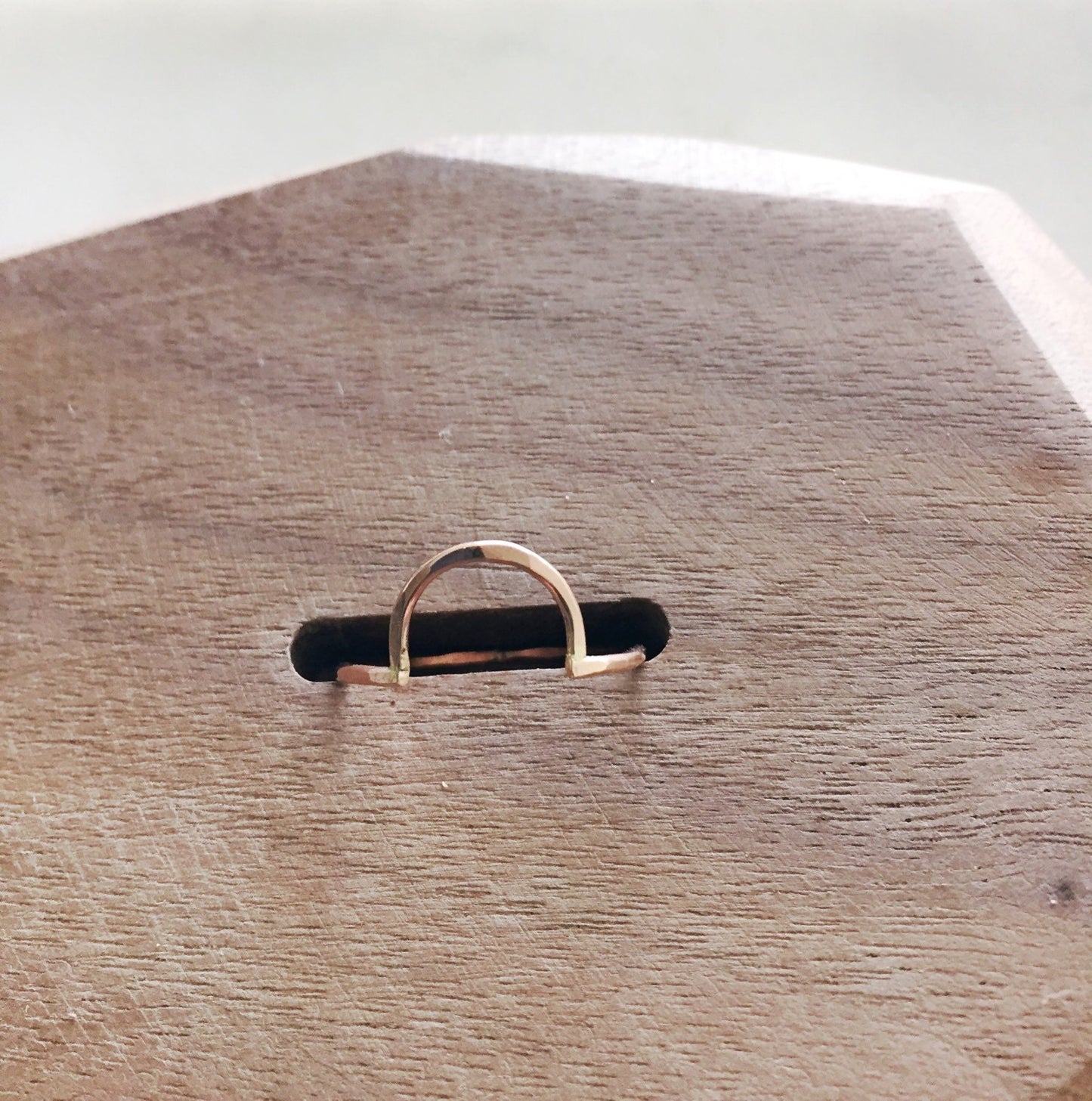 Open half circle ring.