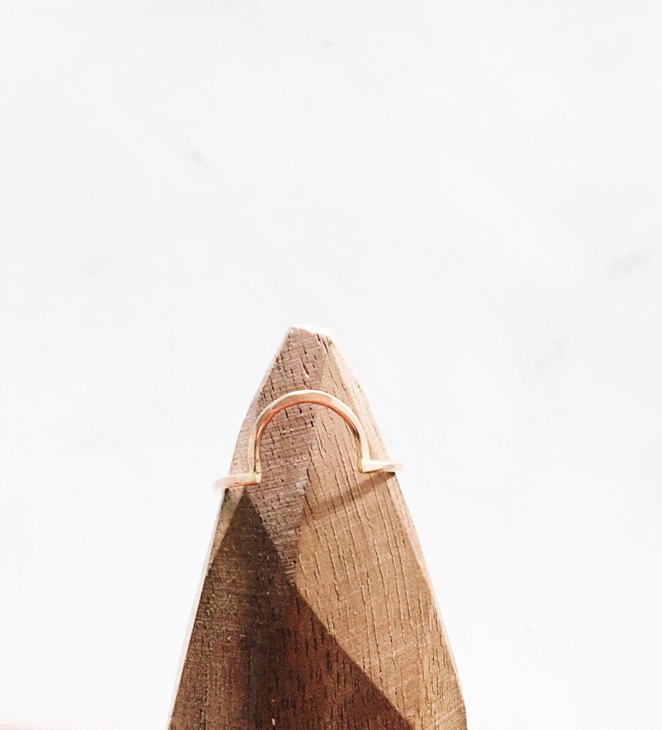 Open half circle ring.
